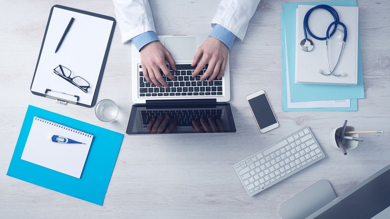 Computer and workspace for researching long-term care insurance options